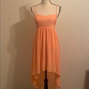 Pink flowing high low dress.